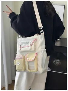 Student nylon crossbody bag with multi-color pockets and adjustable shoulder strap