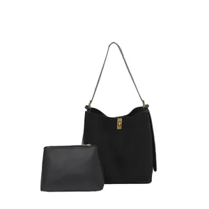 Large retro black bucket bag set with matching inner pouch and gold buckle details