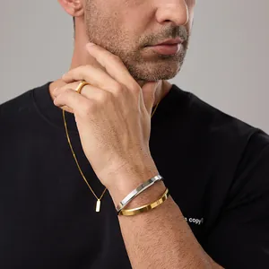 Detail showing high-polished gold and silver stainless steel jewelry set for men and women