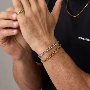 Ensemble bracelet chaîne Figaro dorée et bague vague en acier inoxydable poli pour femme