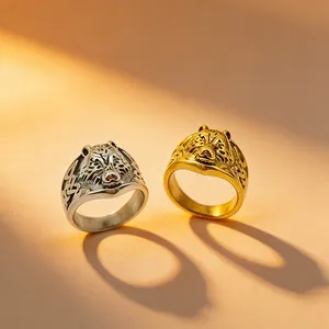 Detailed relief of vintage wolf head ring with Celtic knots in silver and gold finish