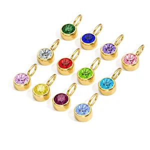 Twelve colorful 8mm birthstone charms with gold round bezel settings for jewelry making