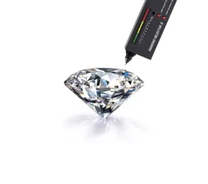 Moissanite diamond pendant being tested with a professional electronic diamond selector tool