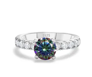 Macro view of S925 sterling silver ring featuring a round moissanite with blue-green fire