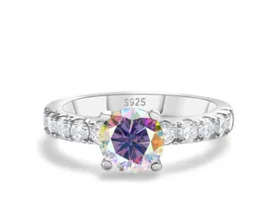 Macro detail of S925 sterling silver stamp and rainbow moissanite stone setting on ring