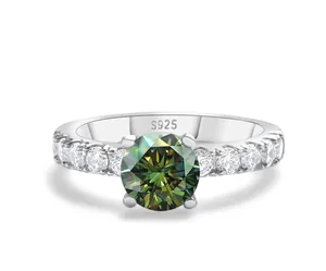 Detailed macro shot of S925 sterling silver stamp on the classic green moissanite ring
