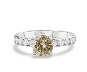 Macro detail of S925 sterling silver ring with champagne gemstone in four-prong setting
