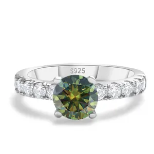 Luxurious S925 sterling silver ring with a round green moissanite and side diamond accents
