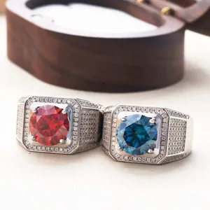 Detail of S925 silver rings with 5ct round blue and red stones in pavé halo setting