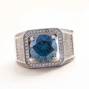 Macro view of a 5ct deep blue round moissanite ring with a halo and pave diamond band