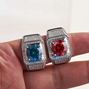 Close-up of 5ct round blue and red moissanite rings in S925 sterling silver settings