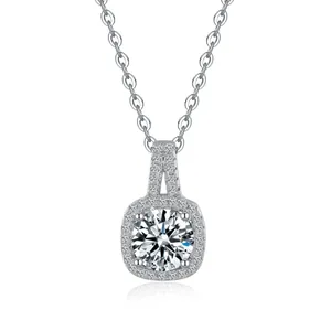 Macro shot of 1-carat moissanite halo pendant in S925 sterling silver on a dainty chain