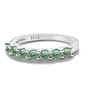 S925 sterling silver seven-stone moissanite ring with turquoise green gems in claw setting