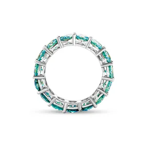 Ewigkeitsring aus S925 Sterlingsilber mit türkisfarbenen Moissanit-Steinen im Rundschliff
