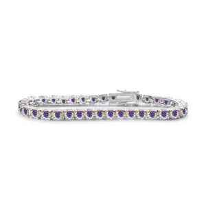 Macro shot of S925 sterling silver stamp and sparkling purple moissanite tennis bracelet