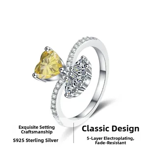 Detail eines S925 Sterlingsilberrings mit herzförmigem gelbem Edelstein und Zirkonia