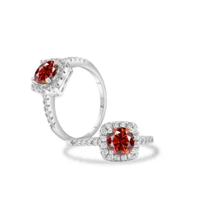 Detailed macro view of S925 silver ring featuring a red center stone and pavé diamonds
