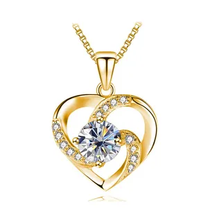 Elegant gold heart pendant necklace with moissanite center stone and pavé accents