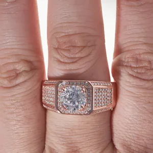 Luxurious rose gold sterling silver ring featuring a large round moissanite and pave setting