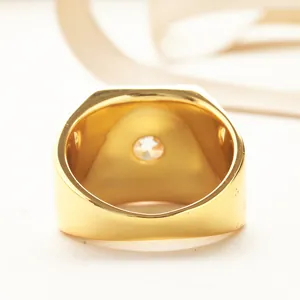 Detailed macro view of the interior structure and polished gold finish of the men's ring