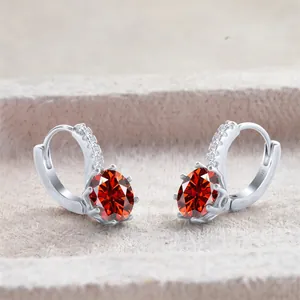 S925 sterling silver earrings featuring red oval gemstones and shimmering accents