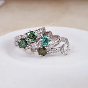 Detailed macro view of S925 sterling silver rings with colorful moissanite stones