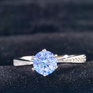 Classic S925 silver ring with 6-prong blue moissanite and pave side stones