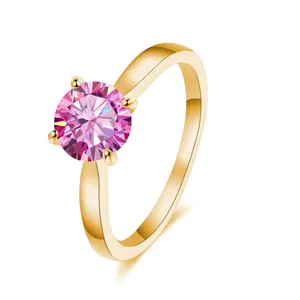 Polished golden S925 silver ring featuring 2-carat round pink moissanite in 4-prong setting