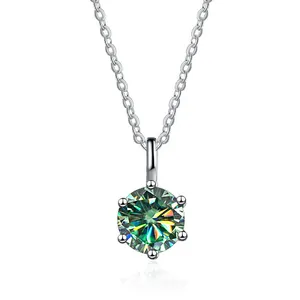 Classic six-prong round cut moissanite solitaire necklace with silver chain on white background