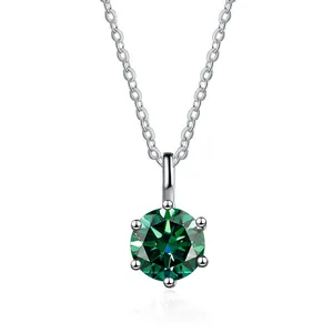 Macro view of a brilliant green moissanite pendant with classic six-prong setting