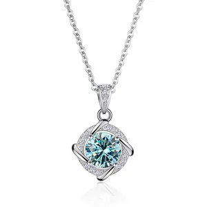 Elegant sterling silver necklace with light blue moissanite pendant on white background