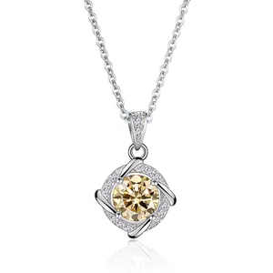 Macro view of champagne moissanite pendant featuring four-prong square halo setting
