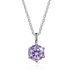 Macro view of purple round moissanite pendant with classic six-prong setting on silver chain