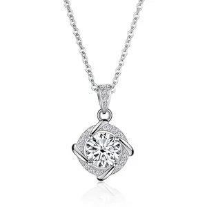 Detailed view of sterling silver moissanite pendant with halo setting and micro-pave diamonds