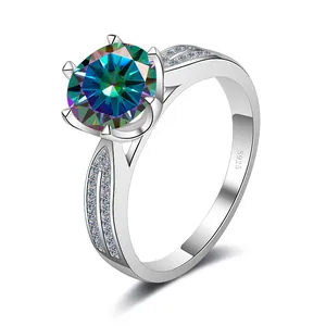 Macro shot of silver ring featuring six-prong moissanite setting and polished finish
