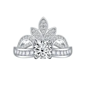 Macro shot of silver crown ring featuring a large center stone and intricate palace style