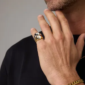 Men's stainless steel Tai Chi Yin Yang rings in gold and silver finish on finger