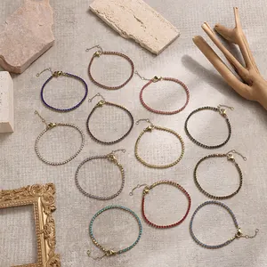 Detailansicht bunter Zirkon-Tennisarmbänder mit Goldfassung und verstellbarem Verschluss