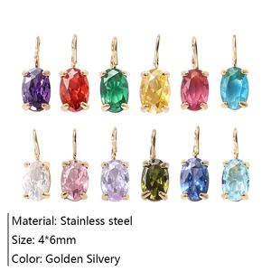 Vue macro de douze pendentifs en zircone colorés 4x6mm en acier inoxydable doré