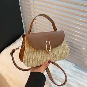 Summer woven straw tote bag with brown leather trim and golden metal lock buckle