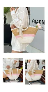 Detail of a color-block woven tote bag with lace bow and sturdy rope handles