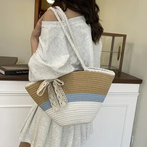Three-tone woven straw tote bag with cream lace bow and thick rope shoulder strap