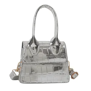 Silver mini crossbody bag with crocodile embossing and metallic mirror finish