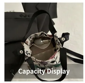 Top view of embroidered floral bucket bag showing interior storage capacity and pockets