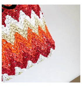 Detailed macro view of vibrant wavy pattern and textured handmade crochet straw weave