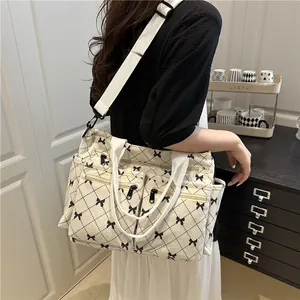 Corduroy quilted tote bag with bow print and multiple functional pockets