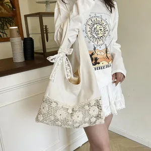 Canvas flower tote bag with crochet hollow lace design and bow strap for summer beach vacation