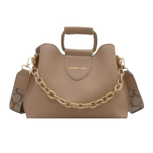Khaki PU leather handbag with golden square handle and cream plastic chain decoration