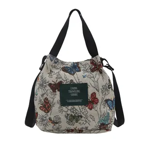 Sac seau rétro à motif papillon avec bandoulière réglable et poignée supérieure