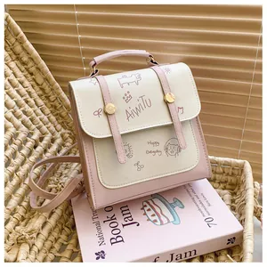 Zaino in ecopelle rosa e beige con stampe di ciliegie e dettaglio manico superiore